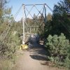 Crossing a bridge along the trail through the Black canyon of the Yellowstone