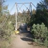 Crossing a bridge along the trail through the Black canyon of the Yellowstone